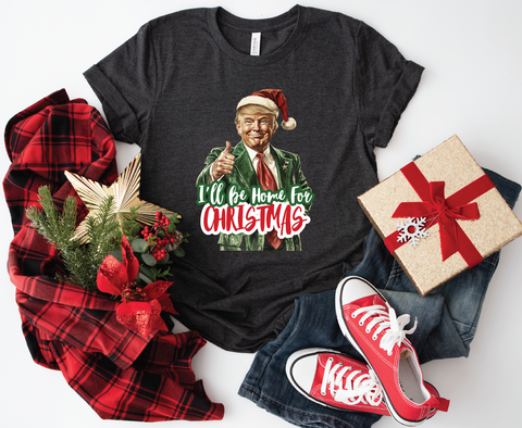 Trump "I'll Be Home for Christmas" softstyle shirt featuring a humorous design, perfect for celebrating the holiday season with a playful touch.